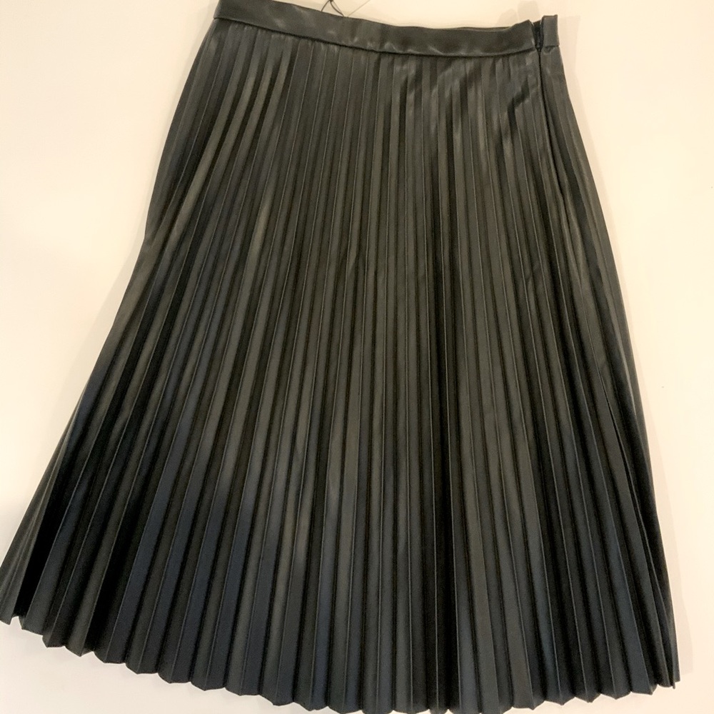 Black pleated faux leather skirt.